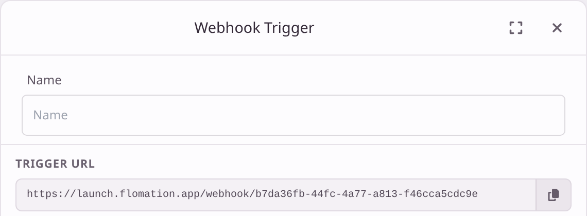 A Webhook Trigger's settings showing its Trigger URL, an address on launch.flomation.app, with a copy button.